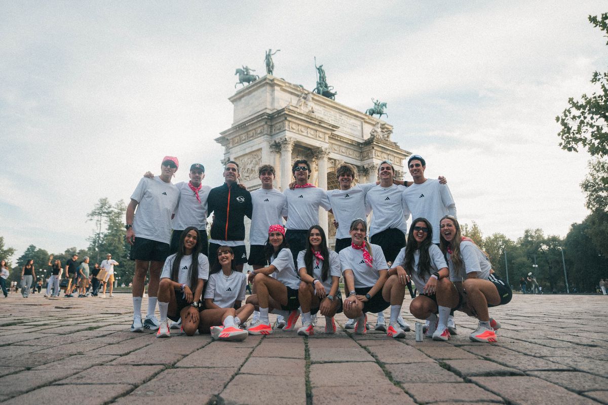 The crew in adidas kit in front of the Arco della Pace in Milan